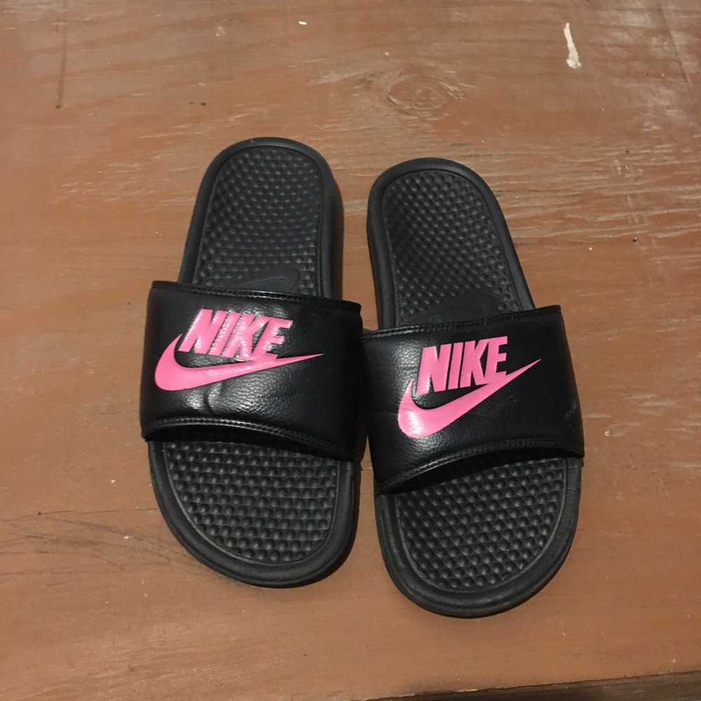 Black and Pink Nike slides